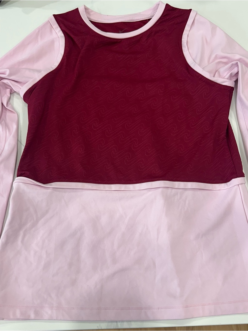 Nike Pro Dri-Fit long sleeve top in burgundy and light pink